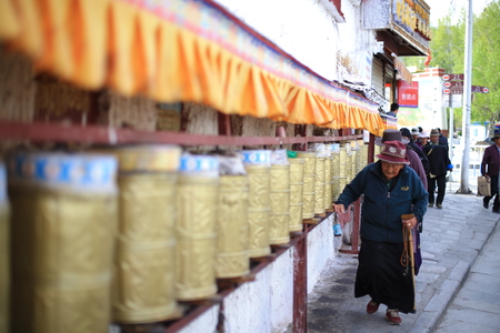 People near the prayer wheelsのeditorial素材