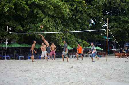 Koh Samed, Rayong, Thailand-July 12, 2017: Men playing volleyball in white sand of Koh Samed Island, Rayong, Thailandのeditorial素材