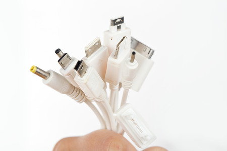 Female hand holding USB port tools charger.の写真素材