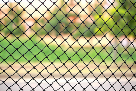 Fishing net on public park background.