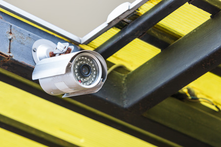 CCTV camera operating outdoor at home roof.の写真素材