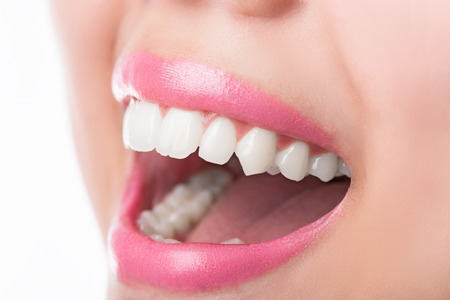 Close up young woman smiling white glamour teeth.の写真素材