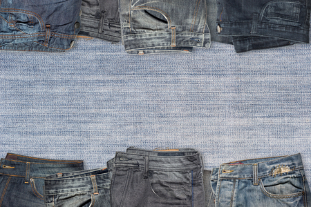 Jeans collection sets on texture background.の写真素材