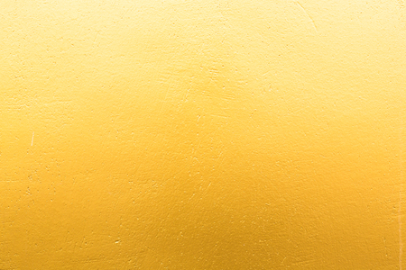Gold concrete wall on background texture.の写真素材