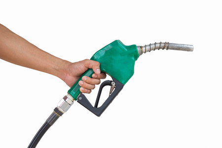 Man holding petrol pump isolated on white background.の写真素材
