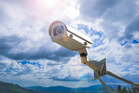 CCTV camera security outdoor on the sky.
