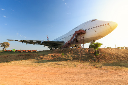 Public airplane landing on runway.の写真素材