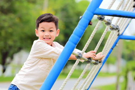 The Boy activity summer joyful on the playground.の写真素材