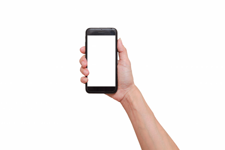 Closeup shot of a woman typing on mobile phone isolated on white background.の写真素材