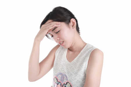 Woman having headache on white background. with clipping pathの写真素材