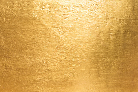 Gold concrete wall on background texture.の写真素材
