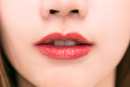 Close-up Beauty Red Lips Makeup Detail. lipstick or Lipgloss.の写真素材
