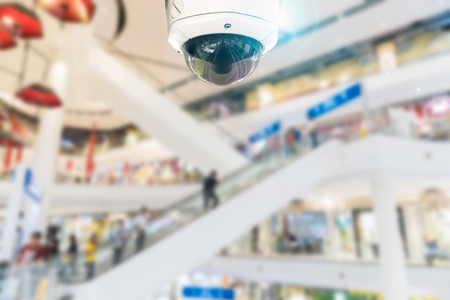 CCTV camera record on blurry store background.