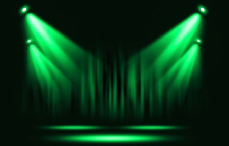 Stage lights. Green spotlight with certain through the darkness.の写真素材
