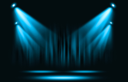 Stage lights. Blue spotlight with certain through the darkness.の写真素材