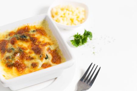 Spinach with cheese on plate.の写真素材