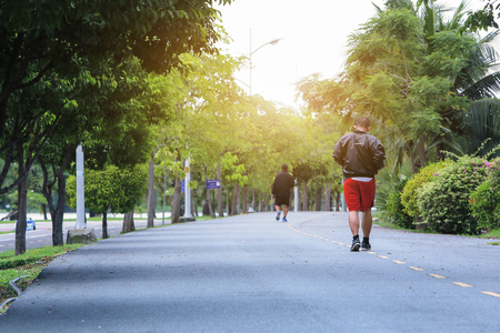 Athletic man running in the park. Healthy lifestyleの写真素材