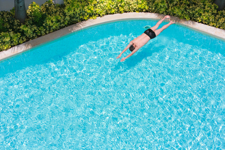 Top view of a man in the swimming pool.の写真素材