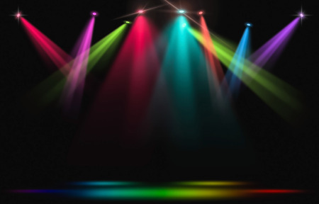 Stage lights. Rainbow spotlight strike through the darkness.の写真素材