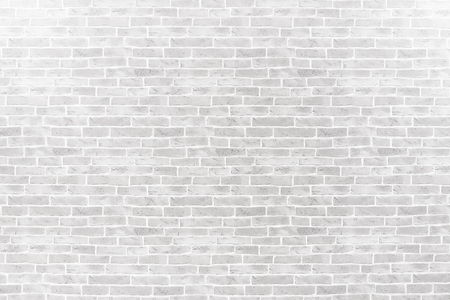 Abstract weathered textured on white brick wall background.の写真素材
