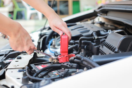 Auto mechanic working at outdoor. Repair service conceptの写真素材