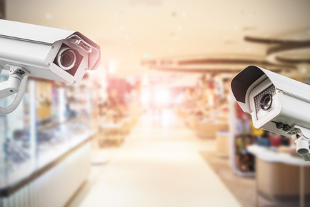 CCTV Security camera department store on blurry background.の写真素材