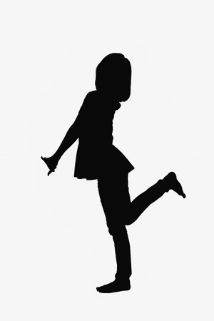 Motion concept - Young woman happy and rejoices on background.の写真素材