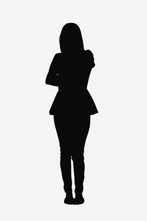 Motion concept - Young woman arms folded white background.の写真素材