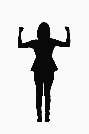 Motion concept - Young woman strong pose on white background.の写真素材