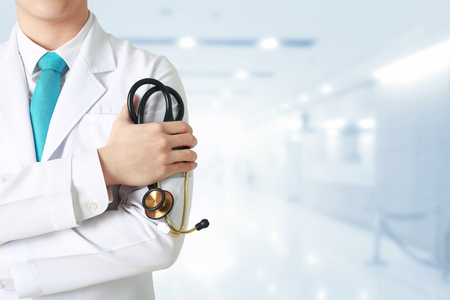 Doctor leading a medical at the blurry hospital background.の写真素材