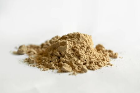 Cocoa protein powder isolated over the white background.の写真素材