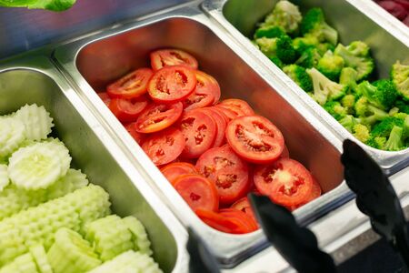 Salad bar include organic vegetables and tomatoes, healthy concept.