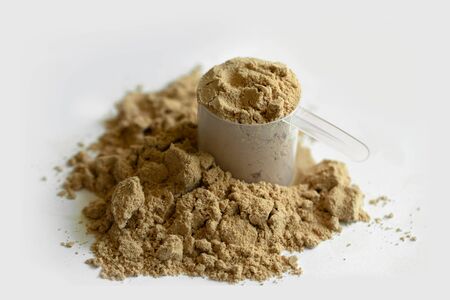 Cocoa protein powder isolated over the white background.の写真素材