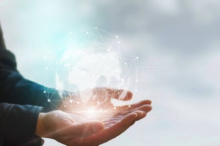 Earth in hands. Global planet on hand. environment conceptの写真素材