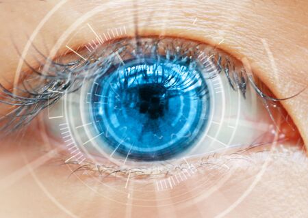 Close up women eye scanning technology in the futuristic, operation, lasik, cataract.の写真素材