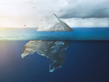 Global warming in the Arctic. Plastic bag iceberg with the bird, environment pollutionの写真素材