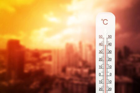 Heat wave in the house thermometer shows in summer.の写真素材