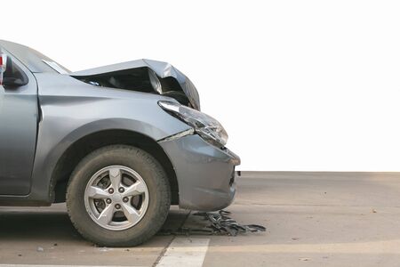 Front of black car get damaged by accident on road. Isolated on white backgroundの写真素材