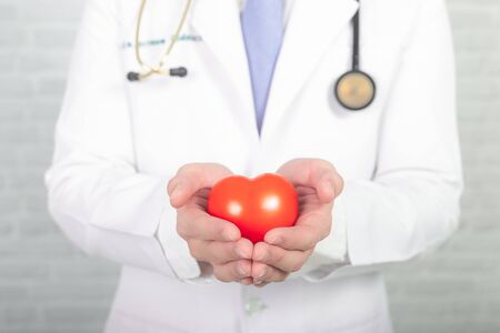 Close up of hands doctor with heart.の写真素材