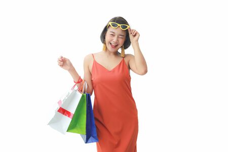 Beautiful asian woman are holding shopping bags. Shopping lifestyle. clipping pathの写真素材