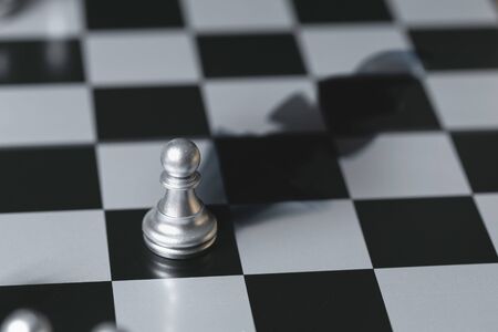 Chess pawn of pieces gathering together as a team to lead and form a king piecepower.の写真素材