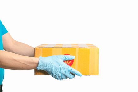 Delivery man holding cardboard boxes in rubber gloves. Express delivery conceptの写真素材