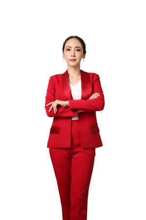 Smiling asian business woman looking at the camera over white background. Use clipping pathの写真素材