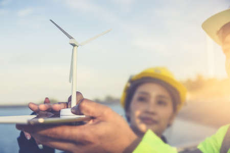 Young female engineer smiling and holding harthat looking to the future.の写真素材