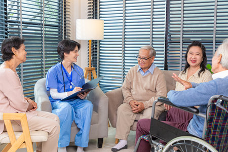 Group of Seniors visiting nursing telling about health complaints, Nurse writing personal information.の写真素材