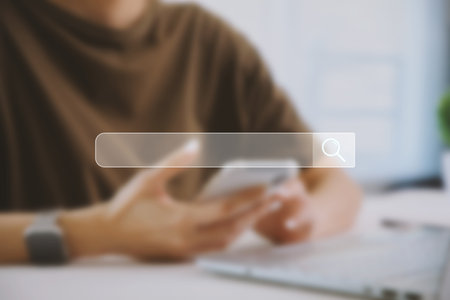 Browsing Internet Data Information. Businesswoman hand using laptop searching on blur backgroundの写真素材