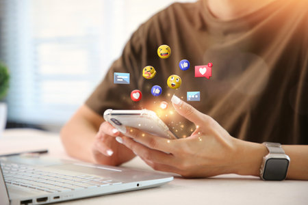 Young business woman watching live streaming. People using social media application concept.の写真素材