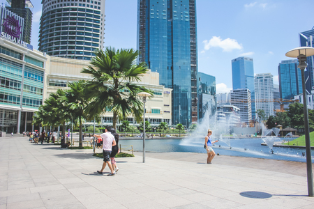 Kuala Lumpur, Malaysia - October 21, 2017: Visitors walking outside the building of Suria KLCC  in Kuala Lumpur, Malaysiaのeditorial素材