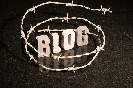 Conceptual or abstract illustration of restricted freedom of speech on blog such as censorship, oppression, or blacklist.の写真素材