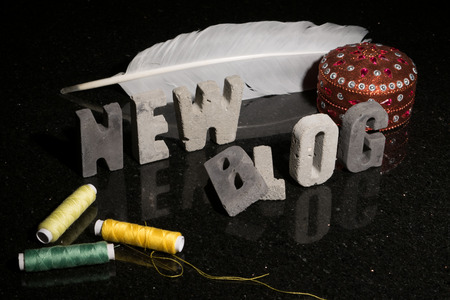 Conceptual or abstract illustration of launching a new fashion, design, sewing, or hand craft blog.